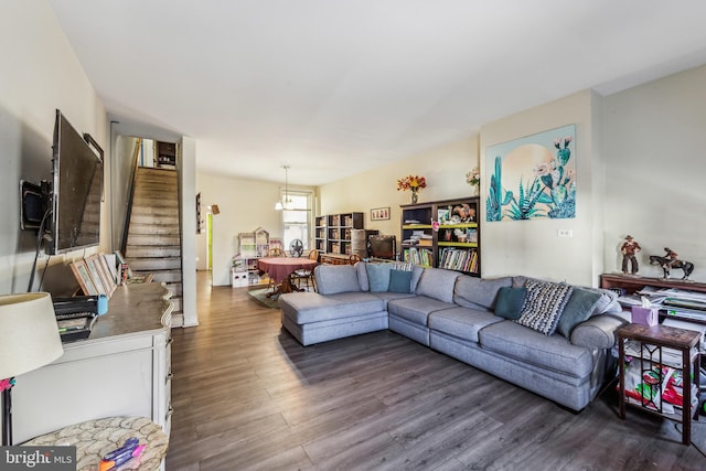 living room with dark hardwood / wood-style flooring