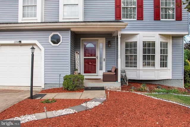 entrance to property with a garage