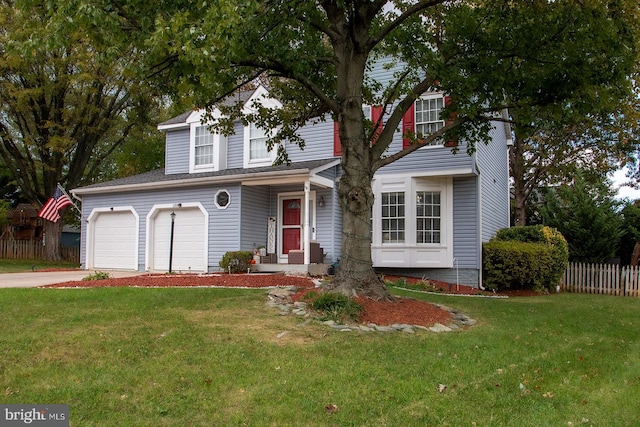 front facade with a front lawn and a garage