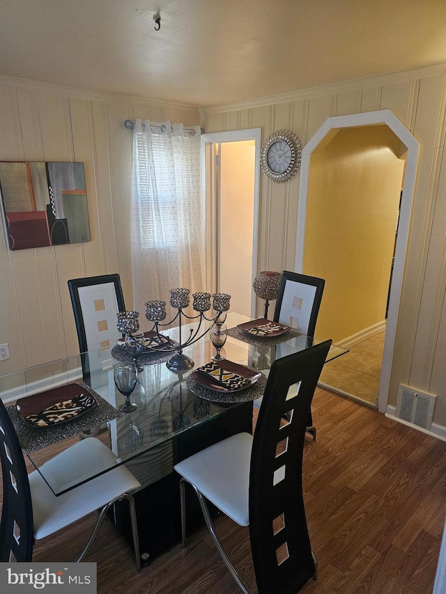 dining area featuring hardwood / wood-style floors