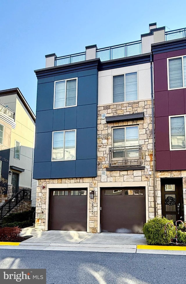 view of front of property with a garage