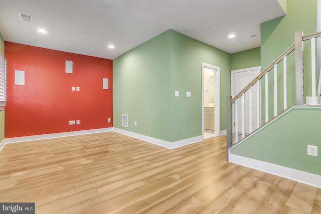 unfurnished room featuring light wood-type flooring