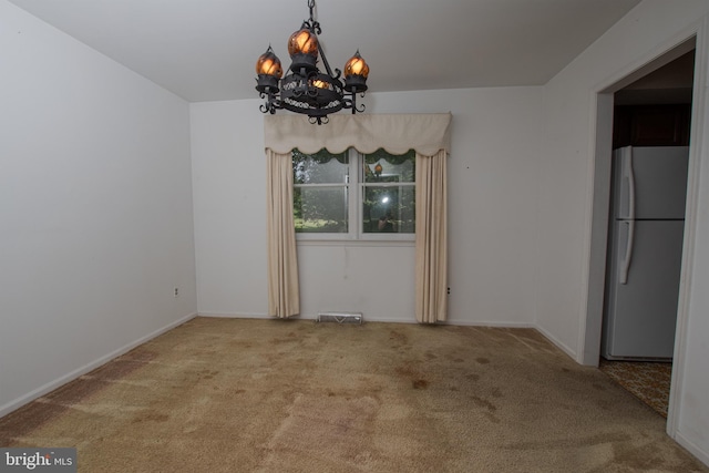 325 Great Oak Dr, Middletown, DE 19709 - unfurnished dining area featuring carpet flooring, a chandelier, and baseboards