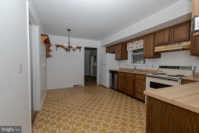 325 Great Oak Dr, Middletown, DE 19709 - kitchen with under cabinet range hood, white appliances, a sink, a chandelier, and light countertops