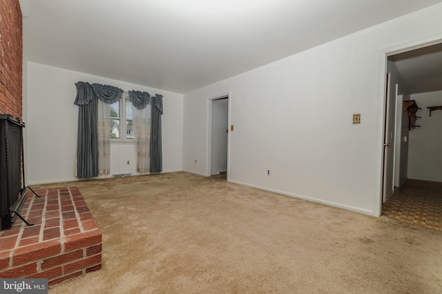 325 Great Oak Dr, Middletown, DE 19709 - unfurnished living room with carpet floors, a fireplace, and baseboards