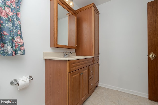 325 Great Oak Dr, Middletown, DE 19709 - bathroom featuring vanity, baseboards, and tile patterned floors