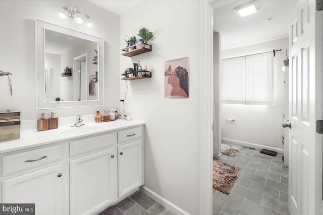 bathroom featuring tile patterned floors and vanity