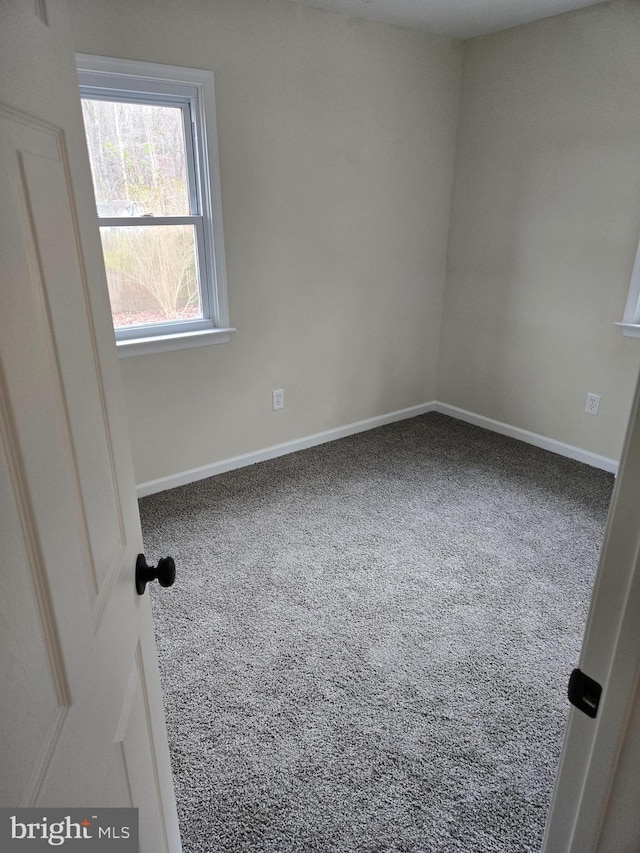 view of carpeted spare room