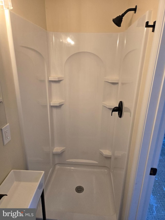 bathroom with a shower