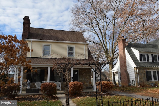 view of front property featuring a porch