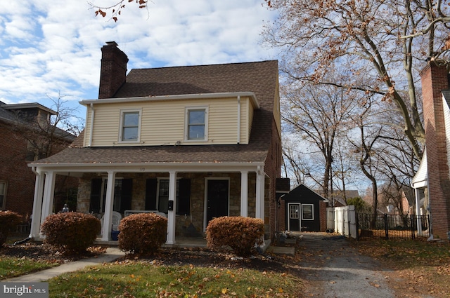 view of front of home featuring covered porch