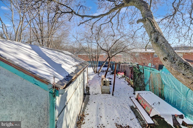 view of yard covered in snow