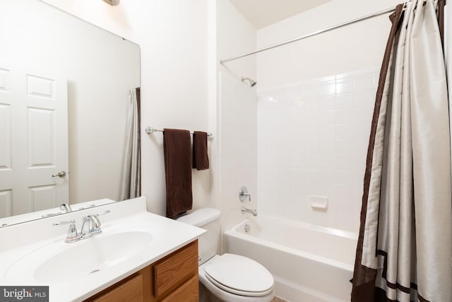 full bathroom with vanity, shower / bathtub combination with curtain, and toilet