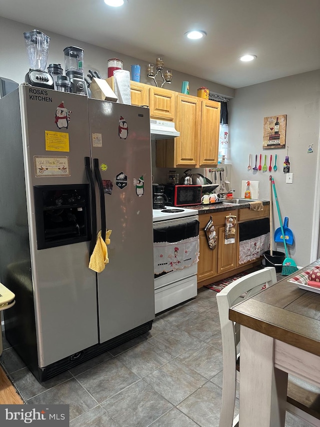 kitchen with white range with electric cooktop, light brown cabinets, stainless steel refrigerator with ice dispenser, and exhaust hood