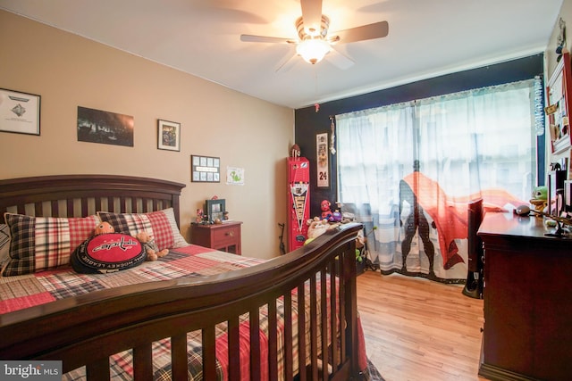 bedroom featuring ceiling fan and light wood-type flooring