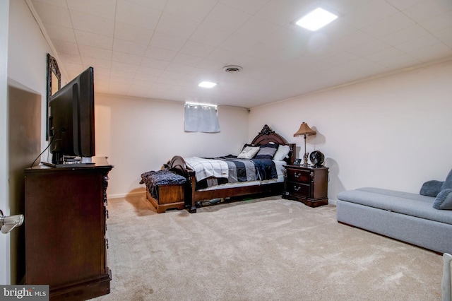 bedroom with light colored carpet