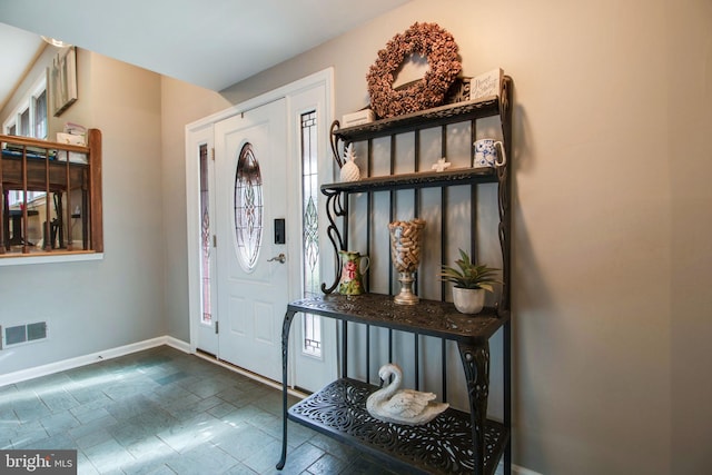 foyer with plenty of natural light