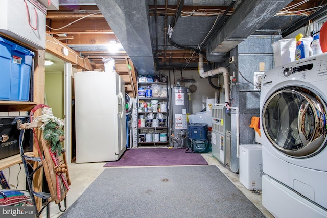 basement with white refrigerator with ice dispenser, washer / clothes dryer, and water heater