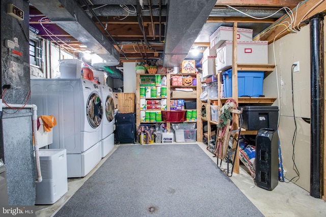 basement featuring washer and clothes dryer