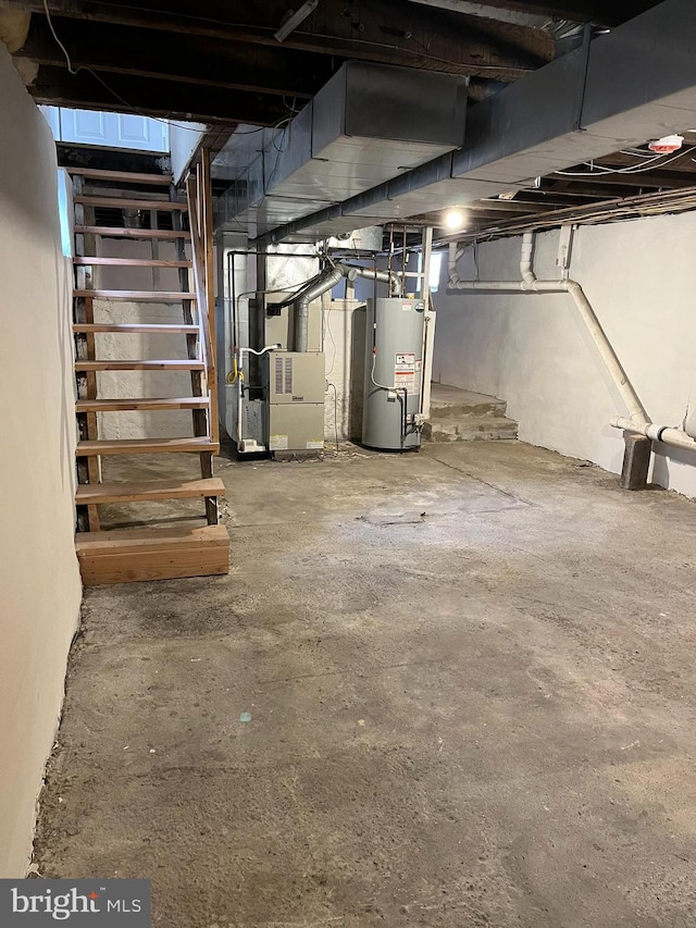 basement with heating unit and water heater