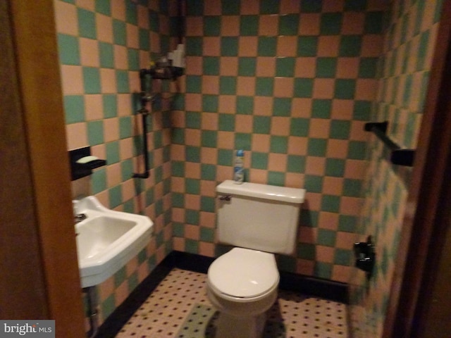 bathroom with toilet and sink