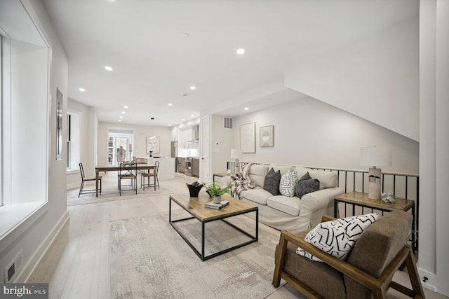 living room with light wood-type flooring