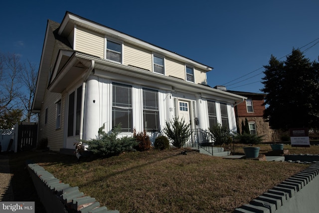 view of front of house with a front yard