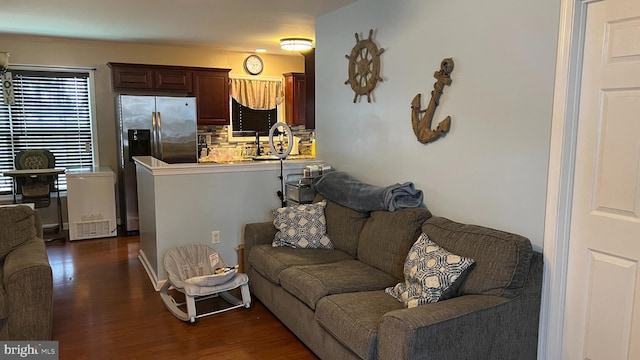 living room featuring dark hardwood / wood-style floors