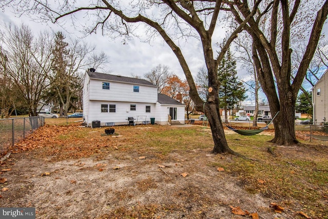 back of property with cooling unit