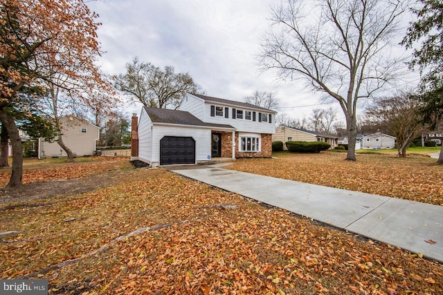 front facade with a garage