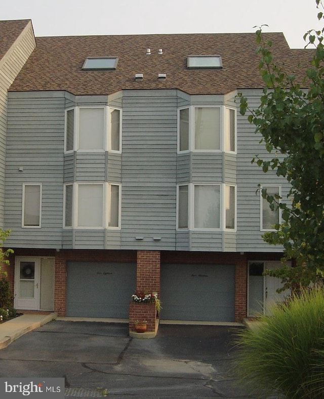 view of property featuring a garage