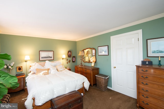 carpeted bedroom with ornamental molding