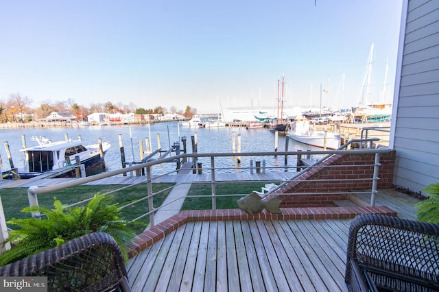 dock area with a water view