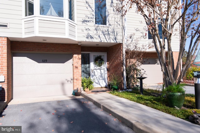 property entrance featuring a garage