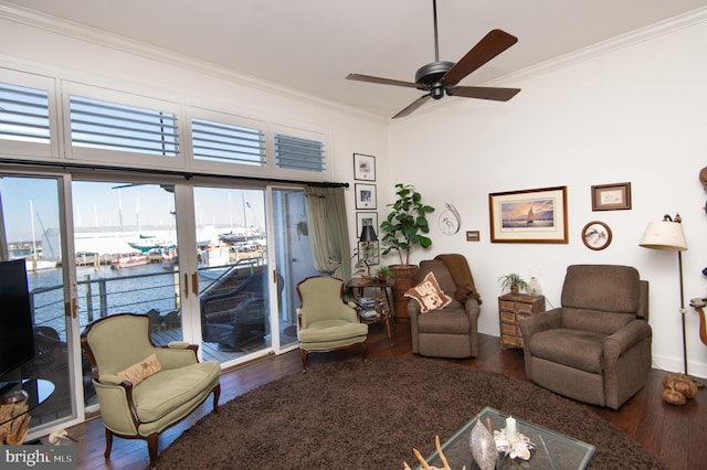 living room with ceiling fan, hardwood / wood-style floors, and ornamental molding