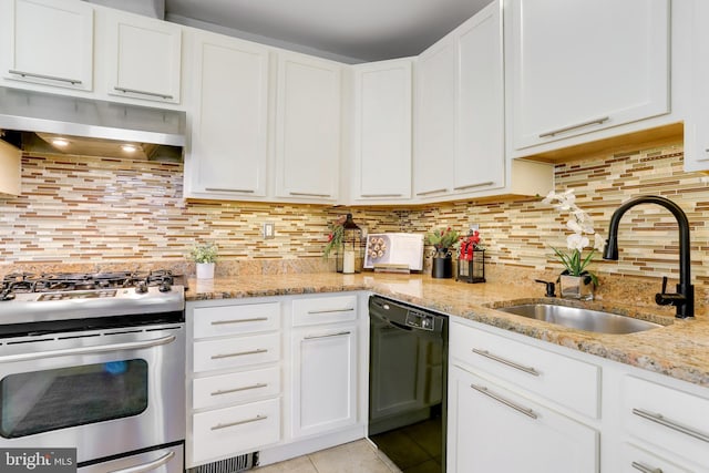 kitchen with dishwasher, white cabinets, sink, stainless steel range, and tasteful backsplash