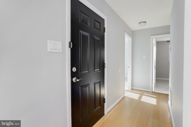 entrance foyer with light wood-type flooring