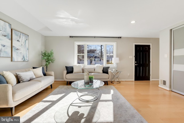 living room featuring light hardwood / wood-style floors