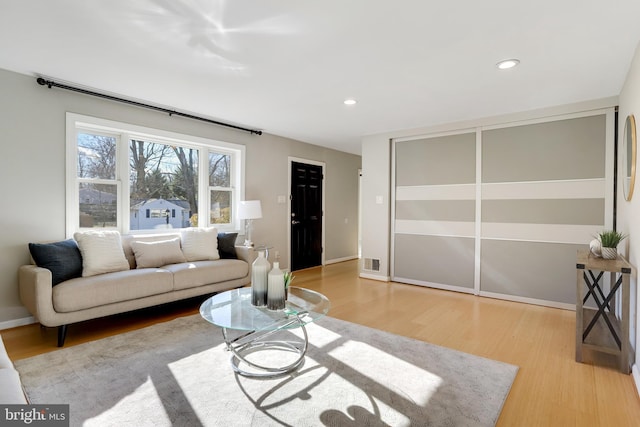 living room featuring light hardwood / wood-style flooring