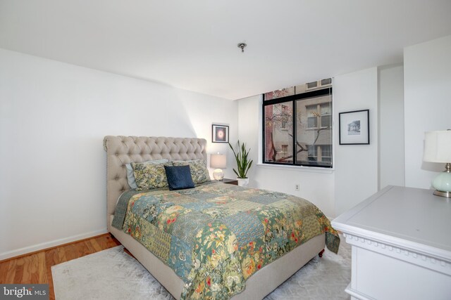 bedroom featuring light hardwood / wood-style floors