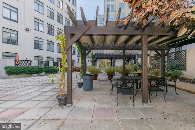 view of patio featuring a pergola