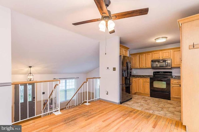 kitchen with ceiling fan, black electric range, light hardwood / wood-style flooring, stainless steel fridge, and lofted ceiling