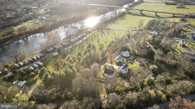 bird's eye view with a water view and a rural view