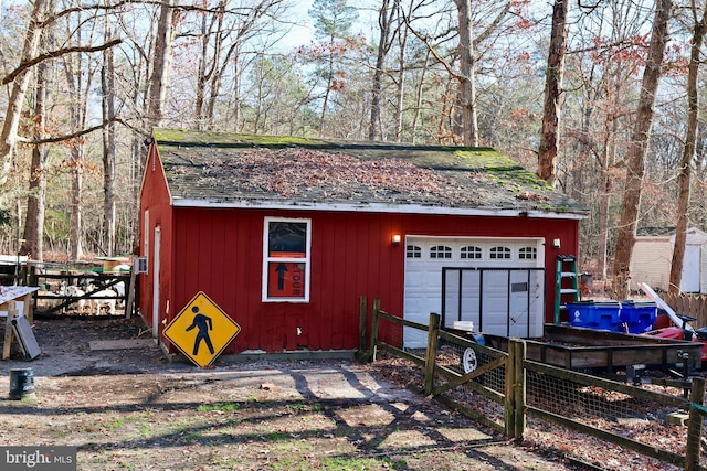 view of outdoor structure with a garage