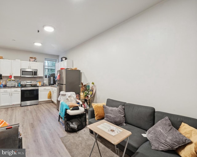 living room featuring light wood-type flooring