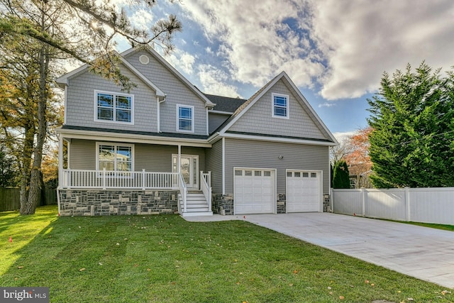 craftsman inspired home with a porch, a garage, and a front lawn