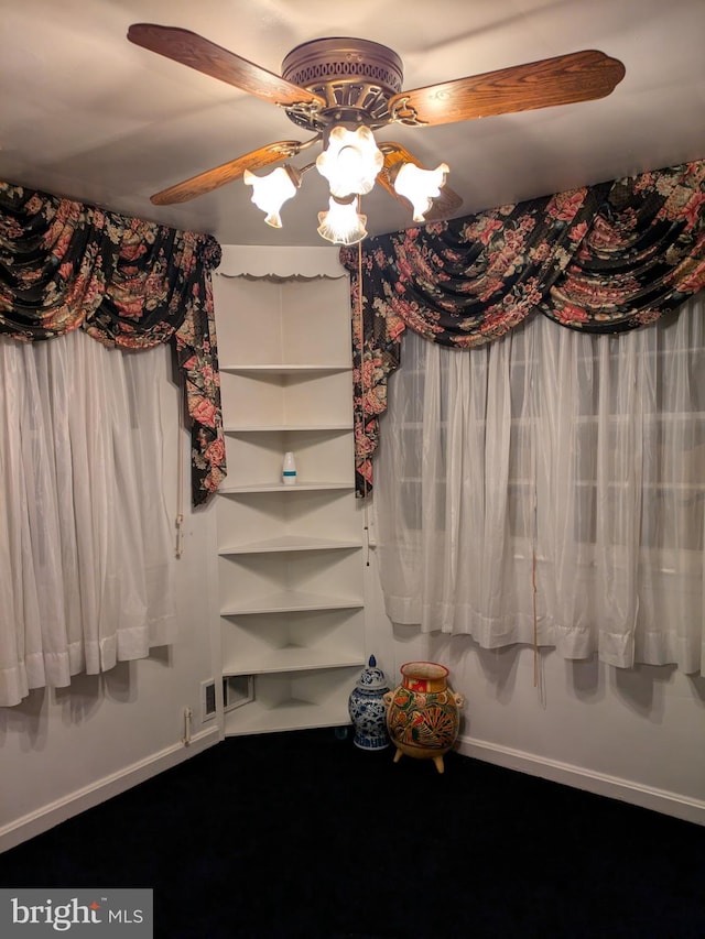 spacious closet featuring ceiling fan