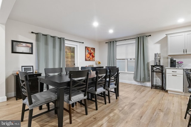 dining space featuring light hardwood / wood-style floors