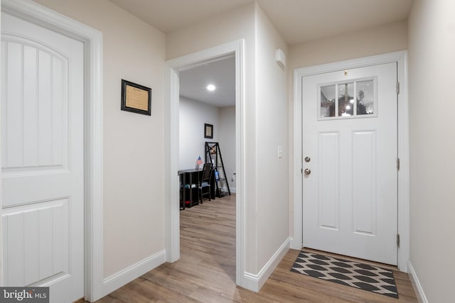 entrance foyer with light hardwood / wood-style flooring