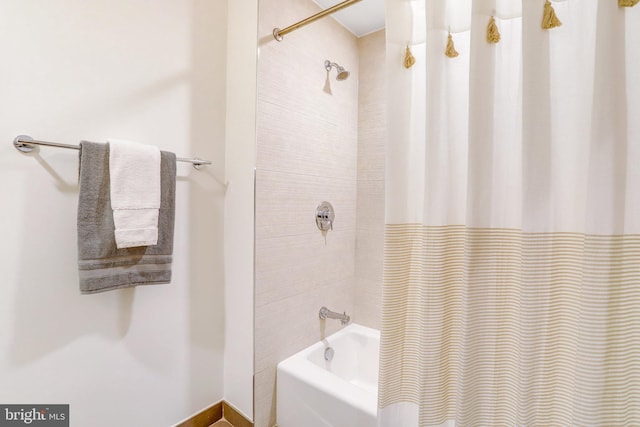 bathroom featuring shower / bath combo with shower curtain